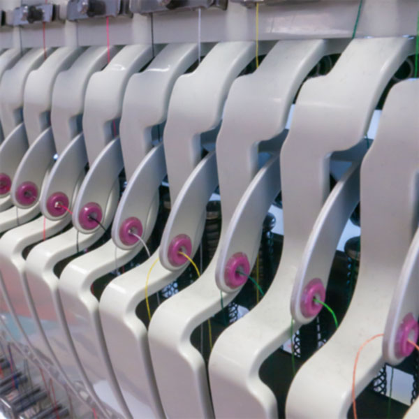 Detailaufnahme einer Stickmaschine